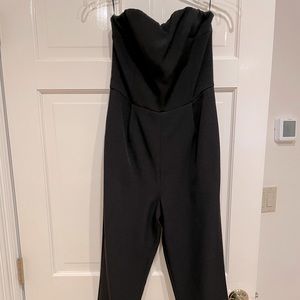 Express black strapless jumpsuit in a size 4